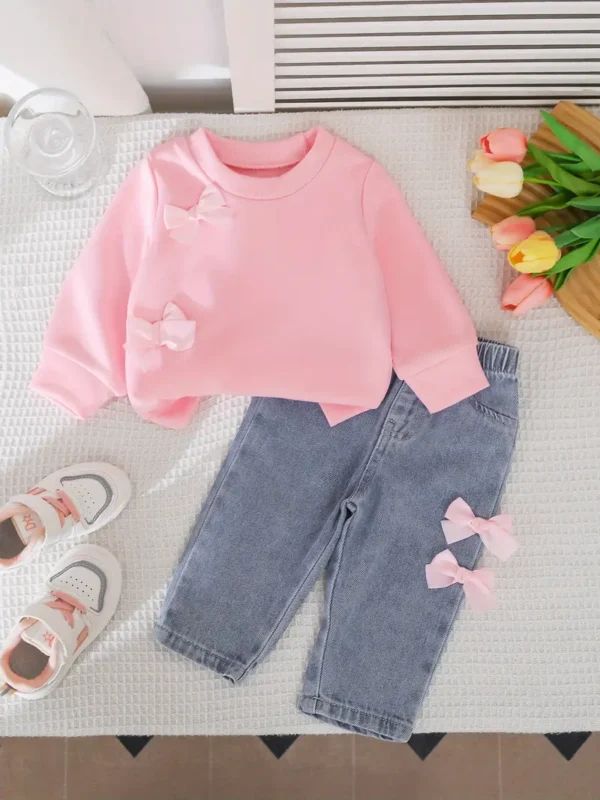 Conjunto pantalón jeans más polera rosada