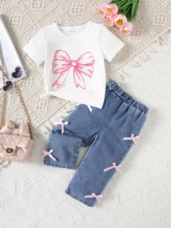 Conjunto pantalón jeans más Polo con lazos rosados
